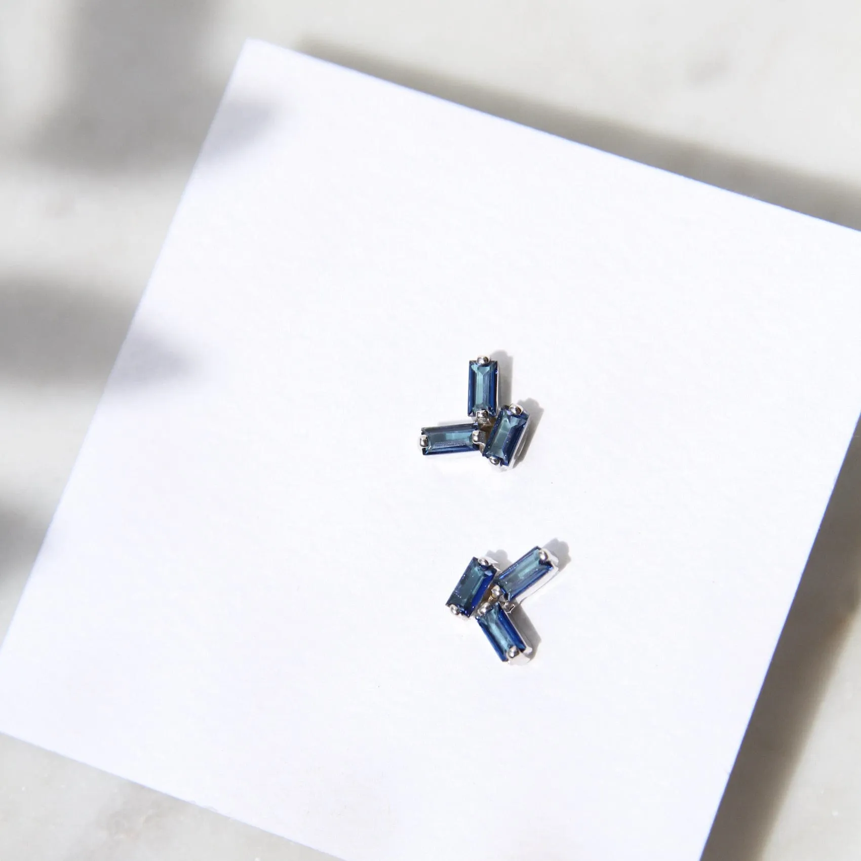 14k White Gold English Blue Topaz Scattered Baguette Earrings