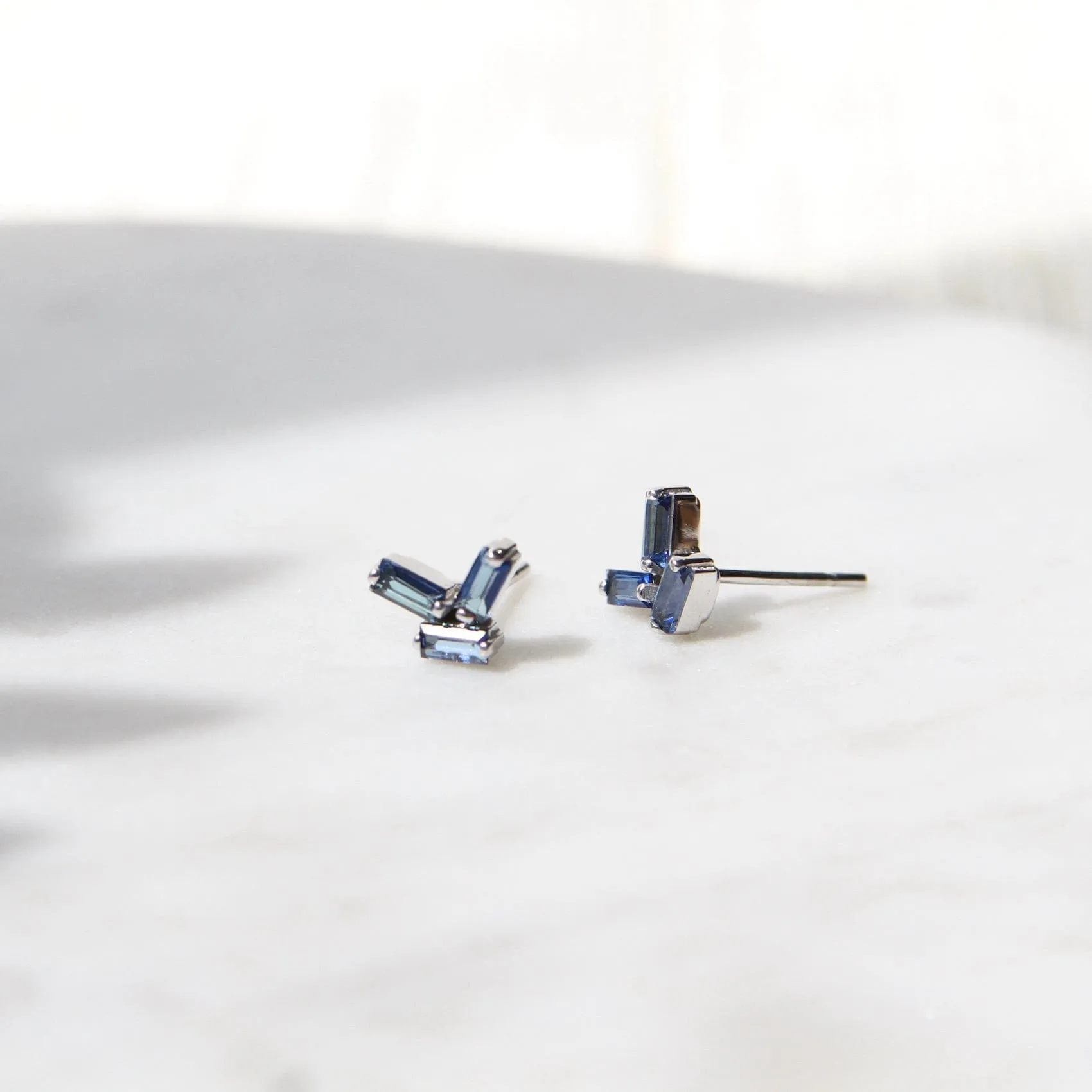 14k White Gold English Blue Topaz Scattered Baguette Earrings