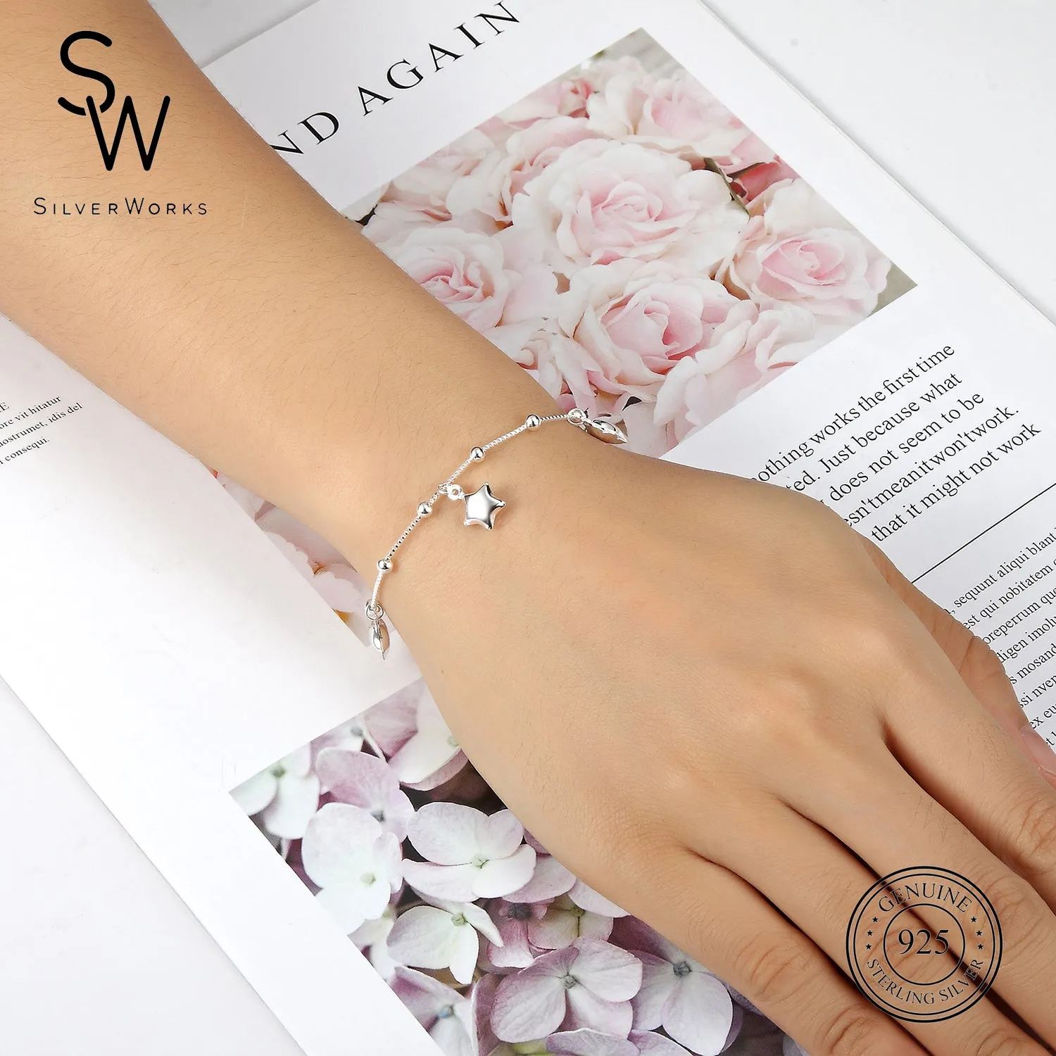 B4614 BRACELET W/DNGLNG 5 STARS 8"