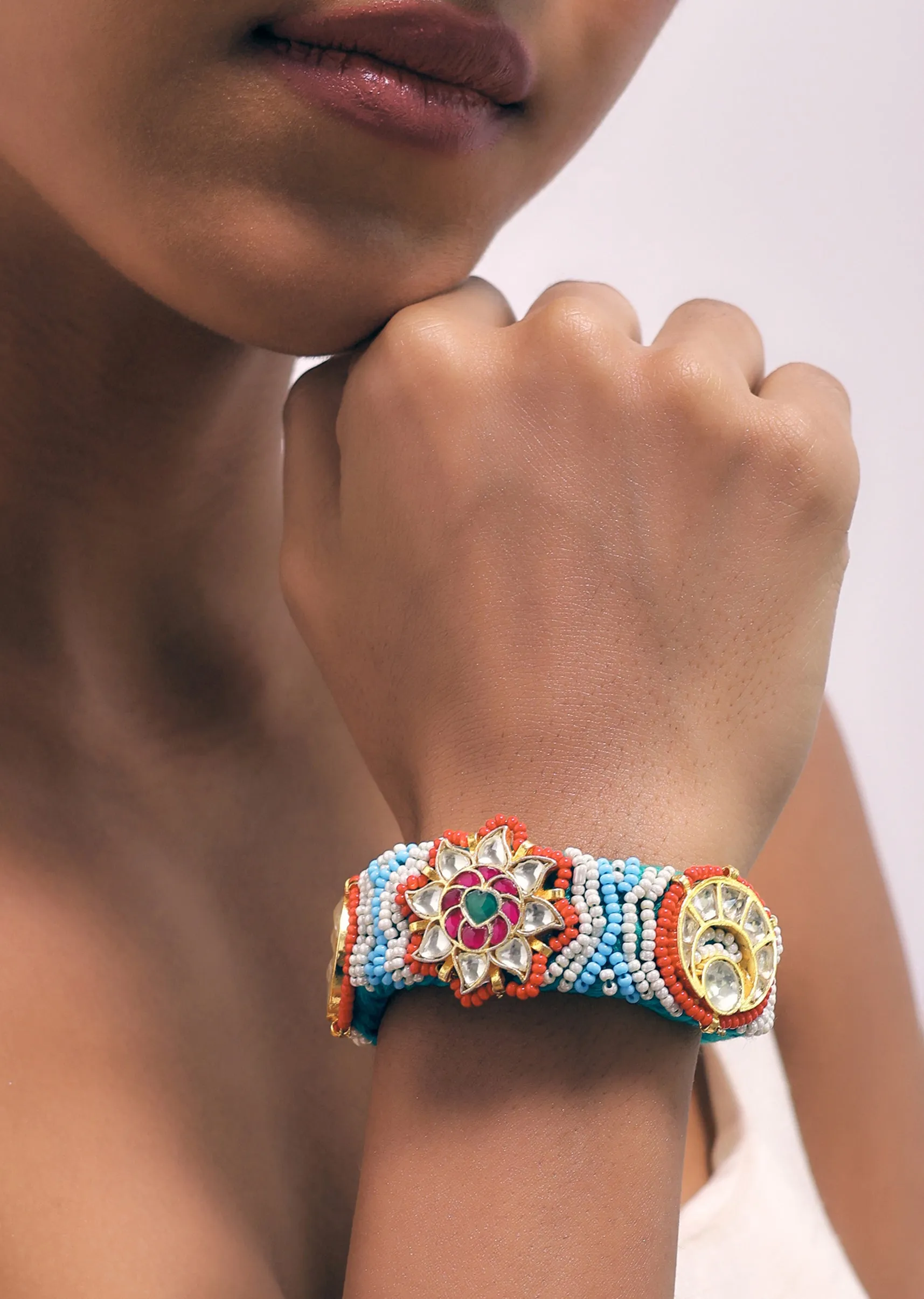 Gold Finish Pachi Kundan Bracelet With Blue Ruby In A Mix Metal