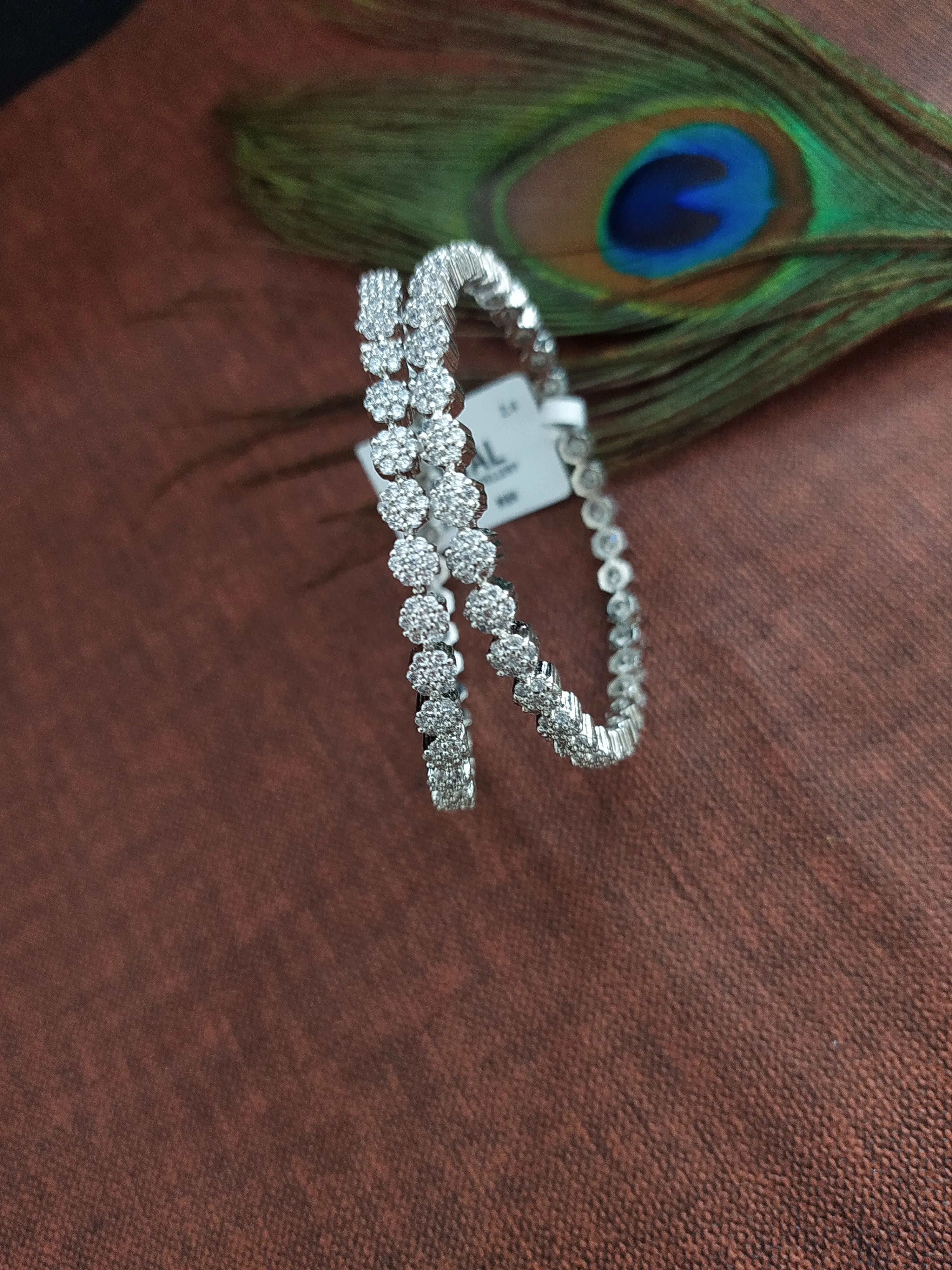Nakshatra Design Silver Plated Zircon Bangles